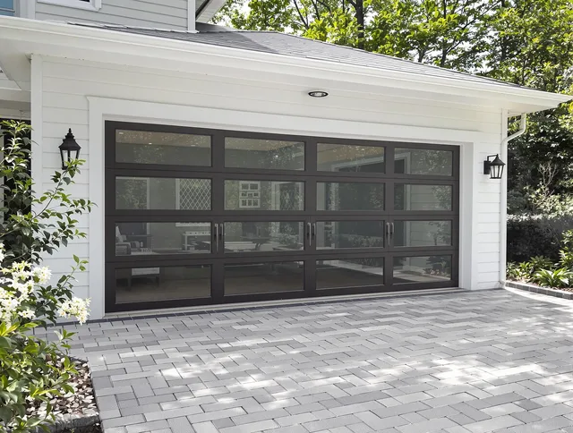 Millbury Garage Door Repair design specialist presenting custom garage door options to Millbury homeowner