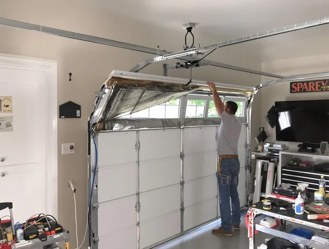 Garage door section replacement by Millbury Garage Door Repair in Millbury