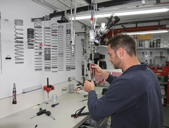 Millbury Garage Door Repair safety certified technician performing precision spring replacement in Millbury