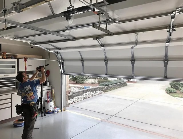 Garage door track repair service by Millbury Garage Door Repair in Millbury